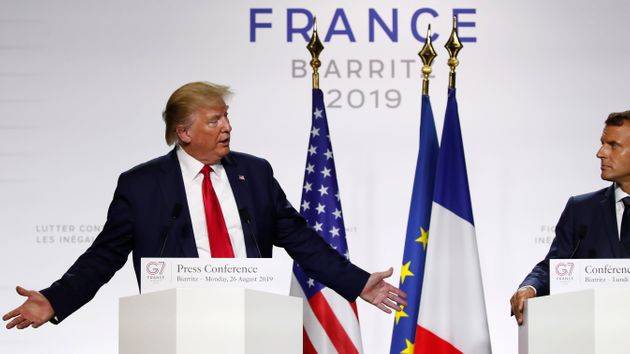 French President Emmanuel Macron and U.S President Donald Trump attend the final press conference during the G7 summit Monday, Aug. 26, 2019 in Biarritz, southwestern France. French president says he hopes for meeting between US President Trump and Iranian President Rouhani in coming weeks. (AP Photo/Francois Mori)