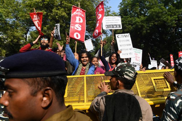 Demonstrators shout slogans to protest against the alleged rape and murder of a 27-year-old veterinary doctor in Hyderabad, in New Delhi on December 2, 2019. (Photo by Sajjad  HUSSAIN / AFP) (Photo by SAJJAD  HUSSAIN/AFP via Getty Images)