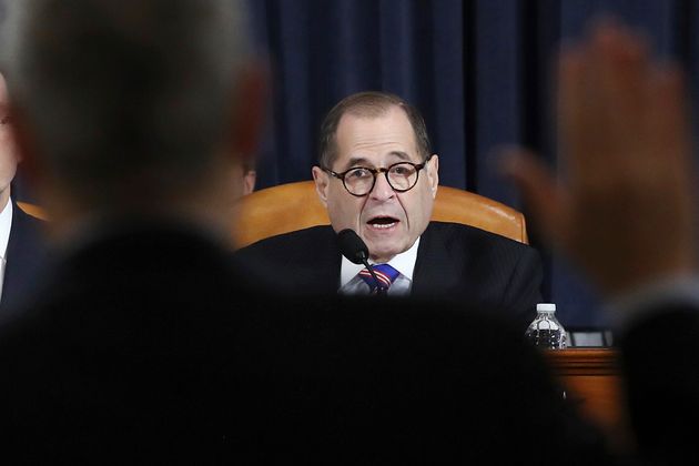 House Judiciary Committee Chairman Rep. Jerrold Nadler, D-N.Y., right, swears in a witness during a hearing before the House Judiciary Committee on the constitutional grounds for the impeachment of President Donald Trump, Wednesday, Dec. 4, 2019, on Capitol Hill in Washington. (Drew Angerer/Pool photo via AP)