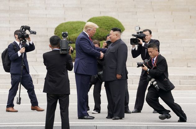 U.S. President Donald Trump meets with North Korean leader Kim Jong Un at the demilitarized zone separating the two Koreas, in Panmunjom, South Korea, June 30, 2019. REUTERS/Kevin Lamarque/File Photo SEARCH 'GLOBAL POY' FOR THIS STORY. SEARCH 'REUTERS POY' FOR ALL BEST OF 2019 PACKAGES. TPX IMAGES OF THE DAY.