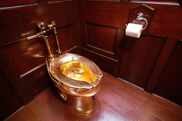 WOODSTOCK, ENGLAND - SEPTEMBER 12: 'America', a fully-working solid gold toilet, created by Maurizio Cattelan, is seen at Benheim Palace on September 12, 2019 in Woodstock, England. The artwork is still missing following what police believe to be a burglary on September 14, in which the toilet, valued by some at £4.8million, was taken. In 1996, Cattelan famously stole the entire contents of one of his own exhibitions in Amsterdam but has strongly denied any involvement with this latest theft. (Photo by Leon Neal/Getty Images)