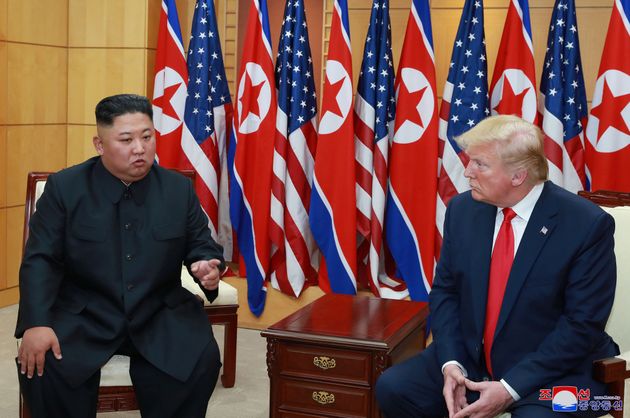 U.S. President Donald Trump speaks with North Korean leader Kim Jong Un during a meeting at the demilitarized zone (DMZ) separating the two Koreas, in Panmunjom, South Korea, June 30, 2019. KCNA via REUTERS    ATTENTION EDITORS - THIS IMAGE WAS PROVIDED BY A THIRD PARTY. REUTERS IS UNABLE TO INDEPENDENTLY VERIFY THIS IMAGE. NO THIRD PARTY SALES. SOUTH KOREA OUT. NO COMMERCIAL OR EDITORIAL SALES IN SOUTH KOREA.