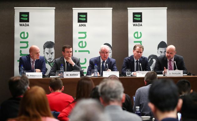 WADA Director, Intelligence and Investigations, Gunter Younger, WADA President-Elect, Witold Banka, WADA President, Sir Craig Reedie, WADA Director General, Olivier Niggli and Chair of the CRC, Jonathan Taylor QC attend a news conference after World Anti-Doping Agency's extraordinary Executive Committee (ExCo) meeting that has banned Russian athletes from all major sporting events in the next four years, in Lausanne, Switzerland, December 9, 2019. REUTERS/Denis Balibouse