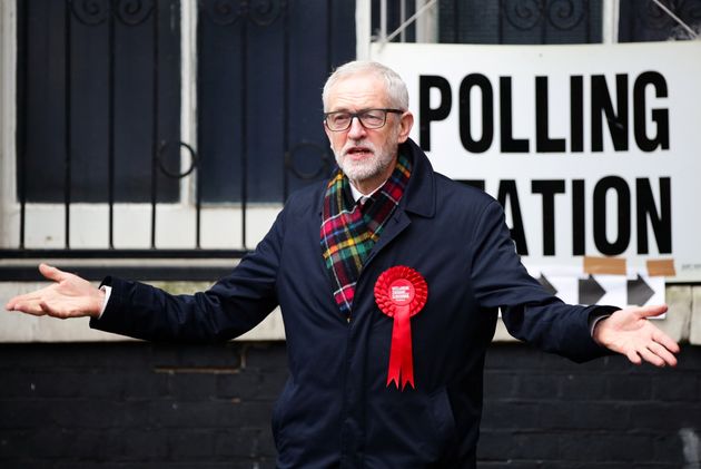Britain's opposition Labour Party leader Jeremy Corbyn gestures outside a polling station after voting in the general election in London, Britain, December 12, 2019. REUTERS/Lisi Niesner
