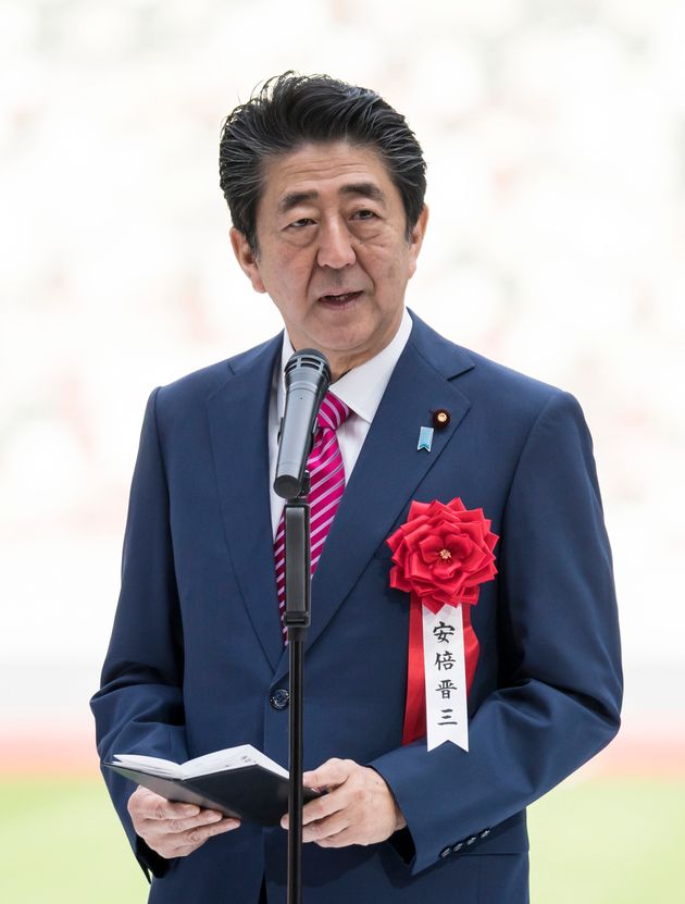 Japan's Prime Minister Shinzo Abe delivers his speech during the construction completion ceremony of the New National Stadium in Tokyo on December 15, 2019. - The Tokyo 2020 Olympics organisers on December 15 celebrated the completion of the main stadium featuring Japanese tradition of using woods, three years after construction work started. (Photo by Tomohiro Ohsumi / POOL / AFP) (Photo by TOMOHIRO OHSUMI/POOL/AFP via Getty Images)