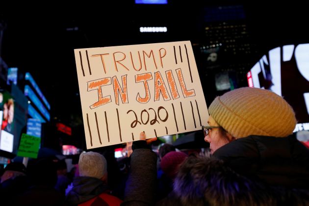 Demonstrators gather to demand the impeachment and removal of U.S. President Donald Trump during a rally at Times Square in New York City, New York, U.S., December 17, 2019. REUTERS/Shannon Stapleton