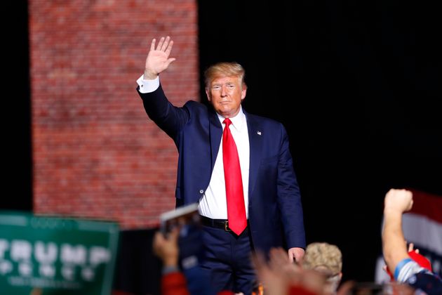 President Donald Trump waves at a campaign rally in Battle Creek, Mich., Wednesday, Dec. 18, 2019. (AP Photo/Paul Sancya)