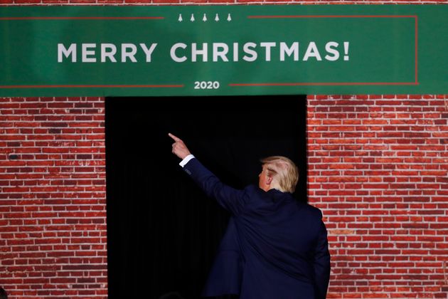 President Donald Trump points as he leaves a campaign rally in Battle Creek, Mich., Wednesday, Dec. 18, 2019. (AP Photo/Paul Sancya)