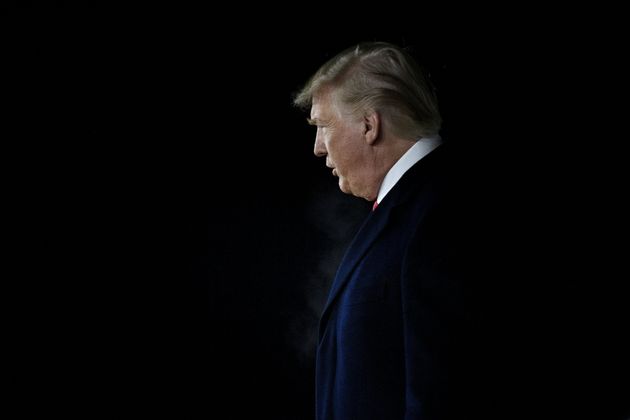 US President Donald Trump arrives at W. K. Kellogg Airport as the US House of Representatives debates his impeachment on December 18, 2019, in Battle Creek, Michigan. (Photo by Brendan Smialowski / AFP) (Photo by BRENDAN SMIALOWSKI/AFP via Getty Images)