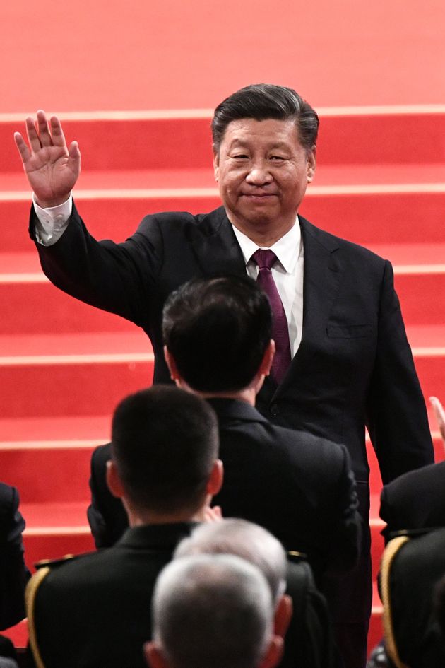 China's President Xi Jinping waves as he departs following the inauguration ceremony of Macau's new Chief Executive Ho Iat-seng as part of 20th anniversary handover celebrations, in Macau on December 20, 2019. - Macau on December 20 marks 20 years since the former colony was returned to China with a celebration led by President Xi Jinping touting the success of the pliant gambling hub while Hong Kong boils. (Photo by Philip FONG / AFP) (Photo by PHILIP FONG/AFP via Getty Images)