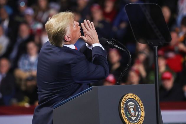 U.S. President Donald Trump reacts while speaking during a campaign rally in Battle Creek, Michigan, U.S., December 18, 2019. REUTERS/Leah Millis?