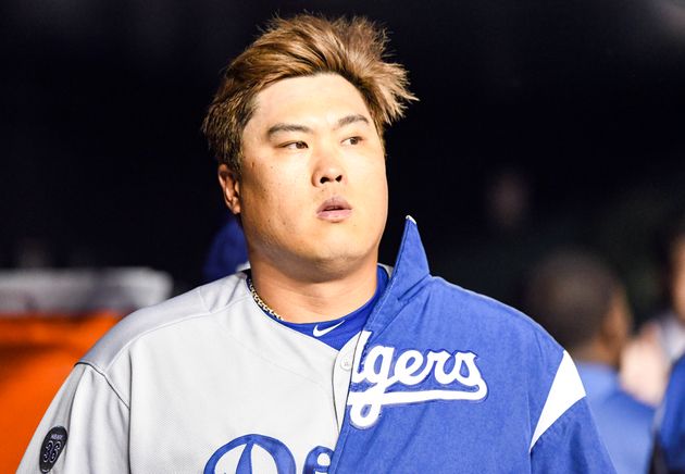 WASHINGTON, DC - OCTOBER 06:  Los Angeles Dodgers starting pitcher Hyun-Jin Ryu (99) walks into the dugout to start Game three of the National League Division Series against the Washington Nationals on October 6, 2019, at Nationals Park, in Washington D.C.  (Photo by Mark Goldman/Icon Sportswire via Getty Images)