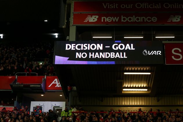 LIVERPOOL, ENGLAND - DECEMBER 29: An LED screen shows the VAR decision to award Liverpool a goal to make it 1-0 during the Premier League match between Liverpool FC and Wolverhampton Wanderers at Anfield on December 29, 2019 in Liverpool, United Kingdom. (Photo by Robbie Jay Barratt - AMA/Getty Images)