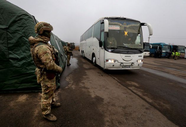 A bus transporting Ukrainian citizens arrives at the checkpoint of the Ukrainian armed forces following the exchange of prisoners of war (POWs) between Ukraine and the separatist republics near the Mayorsk crossing point in Donetsk region, Ukraine December 29, 2019. Ukrainian Presidential Press Service/Handout via REUTERS  ATTENTION EDITORS - THIS IMAGE WAS PROVIDED BY A THIRD PARTY
