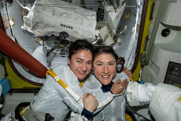 In this photo released by NASA on Friday, Oct. 18, 2019, U.S. astronauts Jessica Meir, left, and Christina Koch pose for a photo in the International Space Station. The astronauts who took part in the first all-female spacewalk are still uplifted by all the excitement down on Earth. Meir said Monday, Oct. 21 that when she floated outside last week, she wasn’t thinking about whether she was going out with a man or woman because everyone is held to the same standard. Nonetheless, she says it was extra special being accompanied by Koch, a close friend.  (NASA via AP)
