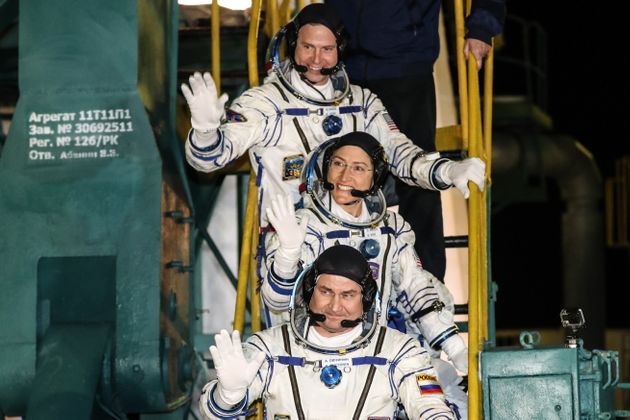 KYZYLORDA REGION, KAZAKHSTAN - MARCH 14, 2019: Roscosmos cosmonaut Alexei Ovchinin (front), NASA astronauts Christina H. Koch and Nick Hague of the ISS Expedition 59/60 prime crew before a launch to the International Space Station. The launch of a Soyuz-FG booster rocket carrying the Soyuz MS-12 spacecraft to the ISS from the Baikonur Cosmodrome is scheduled for March 14, 2019 at 22:14 Moscow time. Sergei Savostyanov/TASS (Photo by Sergei SavostyanovTASS via Getty Images)