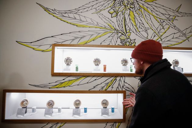A customer shops for a recreational marijuana at Dispensary 33 store on January 1, 2020 in Chicago, Illinois. - On the first day of 2020, recreational marijuana  became legal in Illinois, which joins 10 other US states with legal use of recreational marijuana. (Photo by KAMIL KRZACZYNSKI / AFP) (Photo by KAMIL KRZACZYNSKI/AFP via Getty Images)