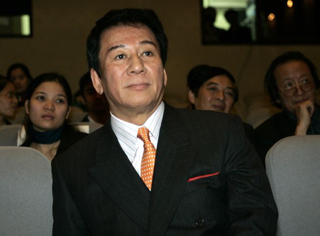 Ryotaro Sugi, goodwill ambassador between Japan and Vietnam listens to a speech prior to a film competition for students  in Hanoi, Vietnam on Saturday Nov. 3, 2007. Sugi was in Vietnam for a week-long visit to further promote friendly relations between the two countries. (AP Photo/Tran Van Minh)
