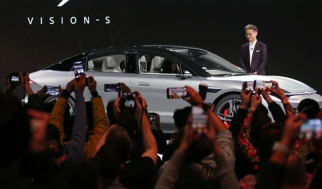 LAS VEGAS, NEVADA - JANUARY 06: Sony President and CEO Kenichiro Yoshida (TOP R) unveils the Sony Vision-S electric concept car during a Sony press event for CES 2020 at the Las Vegas Convention Center on January 6, 2020 in Las Vegas, Nevada. CES, the world's largest annual consumer technology trade show, runs January 7-10 and features about 4,500 exhibitors showing off their latest products and services to more than 170,000 attendees.  (Photo by Mario Tama/Getty Images)