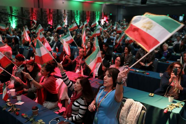 Attendees wave flags as Iranian Americans from across California converge in Los Angeles to participate in the California Convention for a Free Iran and to express support for nationwide protests in Iran from Los Angeles, California, U.S., January 11, 2020. REUTERS/ Patrick T. Fallon