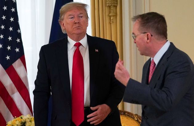 U.S. President Donald Trump looks at Acting White House Chief of Staff Mick Mulvaney during a meeting with NATO Secretary General Jens Stoltenberg (not pictured), ahead of the NATO summit in Watford, in London, Britain, December 3, 2019. REUTERS/Kevin Lamarque