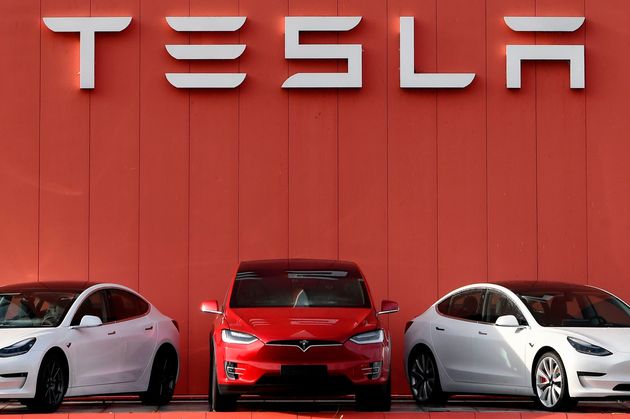 The logo marking the showroom and service center for the US automotive and energy company Tesla in Amsterdam on October 23, 2019. (Photo by JOHN THYS / AFP) (Photo by JOHN THYS/AFP via Getty Images)