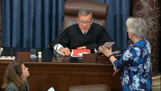 In this image from video, presiding officer Supreme Court Chief Justice John Roberts reads the results of the vote on approving the rules for the impeachment trial against President Donald Trump in the Senate at the U.S. Capitol in Washington, Wednesday, Jan. 22, 2020. Senate resolution 483 passed along a party-line vote of 53-47. (Senate Television via AP)