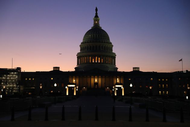 WASHINGTON, DC - JANUARY 21: The sun sets behind the U.S. Capitol Dome during the first evening of President Donald Trump's impeachment trial January 21, 2020 in Washington, DC. Senators are expected to vote on the rules for the impeachment trial, which is expected to last three to five weeks. (Photo by Chip Somodevilla/Getty Images)