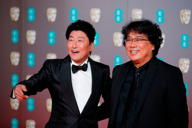 South Korean actor Song Kang Ho and South Korean director Bong Joon-ho at the BAFTA British Academy Film Awards at the Royal Albert Hall in London on February 2, 2020. 