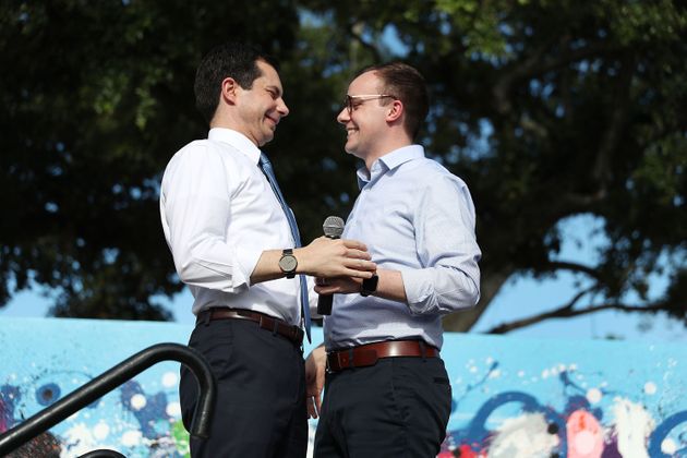 MIAMI, FLORIDA - MAY 20: Democratic presidential candidate and South Bend, Indiana Mayor Pete Buttigieg (L) is introduced by his husband, Chasten Glezman Buttigieg, as he takes to the stage during a grassroots fundraiser at the Wynwood Walls on May 20, 2019 in Miami, Florida. (Photo by Joe Raedle/Getty Images)