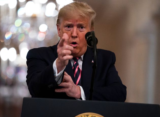President Donald Trump gestures as he speaks in the East Room of the White House in Washington, Thursday, Feb. 6, 2020. (AP Photo/Evan Vucci)