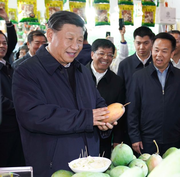 KUNMING, Jan. 20, 2020 -- Chinese President Xi Jinping, also general secretary of the Communist Party of China Central Committee and chairman of the Central Military Commission, visits the Kunming international convention and exhibition center in southwest China's Yunnan Province, Jan. 20, 2020.
   Xi visited the center to learn about the supply of necessities and the sale of domestic and foreign commodities ahead of the Spring Festival, or the Chinese New Year.
   Xi talked warmly with the crowd and extended his Chinese New Year's greetings to people of all ethnic groups in the country. (Photo by Yin Bogu/Xinhua via Getty) (Xinhua/Yin Bogu via Getty Images)