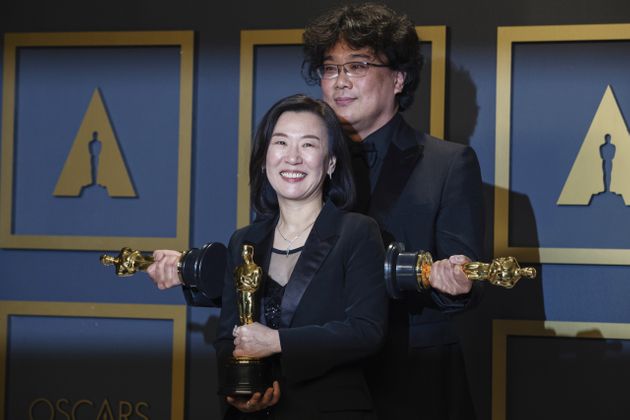Kwak Sin Ae and Bong Joon Ho pose with the Oscar for Best Picture for 'Parasite' in the photo room at the 92nd Academy Awards in Hollywood, Los Angeles, California, U.S., February 9, 2020. REUTERS/Lucas Jackson