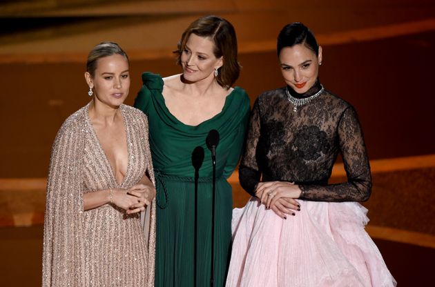 Brie Larson, from left, Sigourney Weaver and Gal Gadot introduce a performance by maestro Eimear Noone at the Oscars on Sunday, Feb. 9, 2020, at the Dolby Theatre in Los Angeles. (AP Photo/Chris Pizzello)