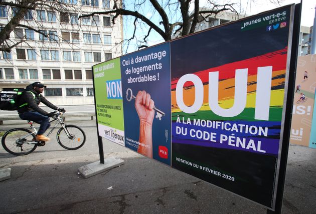 A poster in favour of the change of the penal code is pictured ahead of a referendum on anti-homophobia law in Geneva, Switzerland, February 6, 2020.  The poster reads : 'Yes to the change of the penal code'. Picture taken February 6, 2020. REUTERS/Denis Balibouse
