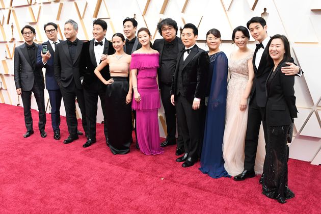 HOLLYWOOD, CALIFORNIA - FEBRUARY 09: Parasite cast and crew  attends the 92nd Annual Academy Awards at Hollywood and Highland on February 09, 2020 in Hollywood, California. (Photo by Steve Granitz/WireImage)