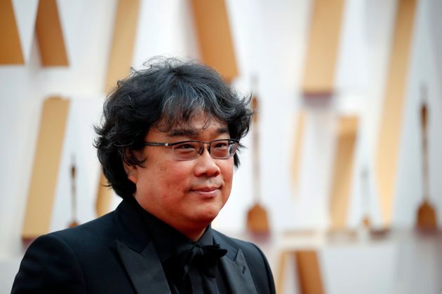 Parasite director Bong Joon Ho poses on the red carpet during the Oscars arrivals at the 92nd Academy Awards in Hollywood, Los Angeles, California, U.S., February 9, 2020. REUTERS/Mike Blake