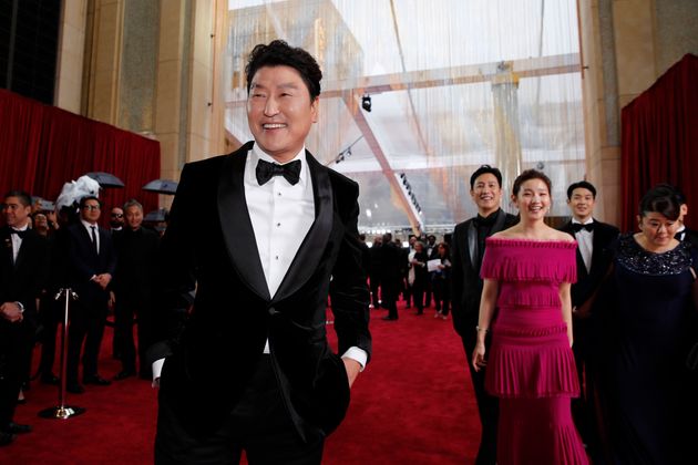 South Korean actor Song Kang-ho and the cast of Parasite pose on the red carpet during the Oscars arrivals at the 92nd Academy Awards in Hollywood, Los Angeles, California, U.S., February 9, 2020. REUTERS/Mike Blake