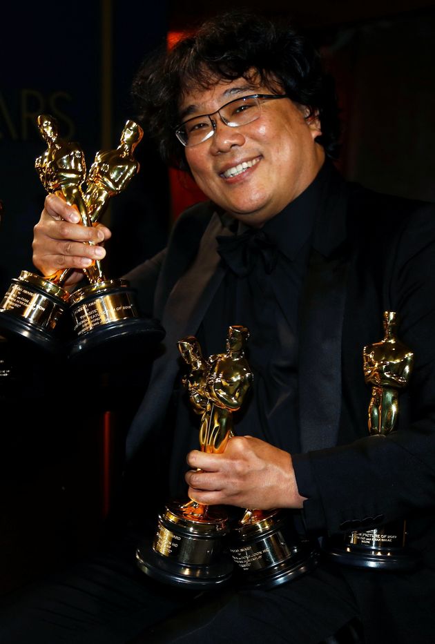 Bong Joon Ho poses with the Oscars for 'Parasite' at the Governors Ball following the 92nd Academy Awards in Los Angeles, California, U.S., February 9, 2020. REUTERS/Eric Gaillard     TPX IMAGES OF THE DAY