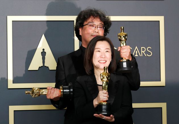 Kwak Sin Ae and Bong Joon Ho pose with the Oscar for Best Picture for 'Parasite' in the photo room during the 92nd Academy Awards in Hollywood, Los Angeles, California, U.S., February 9, 2020. REUTERS/Lucas Jackson
