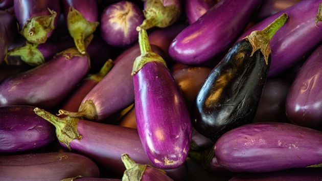 A view of colorful eggplant, from directly above.