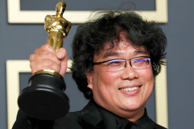Bong Joon Ho poses with the Oscar for Best Picture for 'Parasite' in the photo room during the 92nd Academy Awards in Hollywood, Los Angeles, California, U.S., February 9, 2020. REUTERS/Lucas Jackson