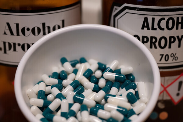 21 September 2021, Berlin: Capsules lie in a tray in a back room at the Schlachtensee pharmacy. The first German Pharmacists' Day takes place on 22 September. Photo: Monika Skolimowska/dpa-Zentralbild/dpa (Photo by Monika Skolimowska/picture alliance via Getty Images)