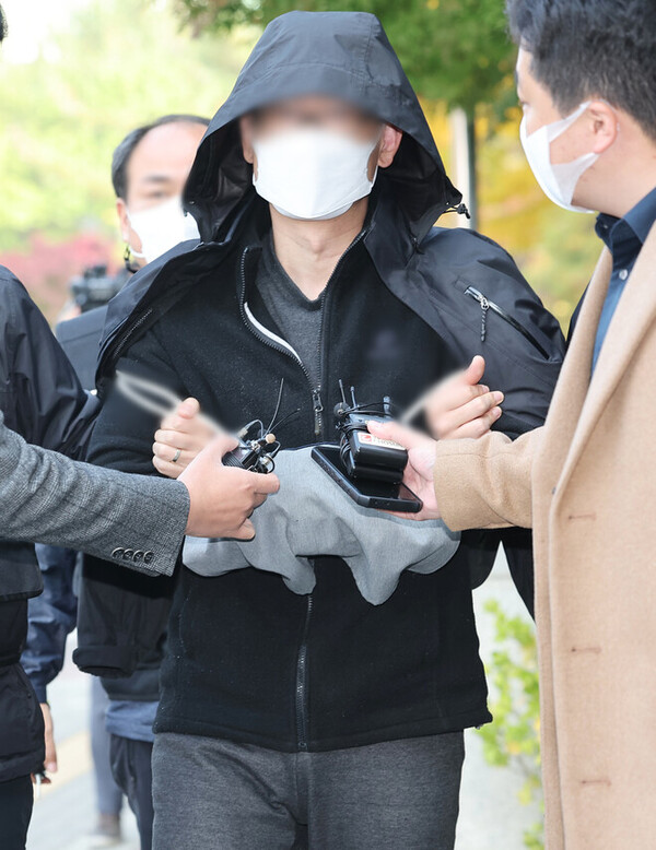 아내와 10대인 두 아들을 살해한 혐의로 구속 기소된 40대 ㄱ씨. ⓒ연합뉴스