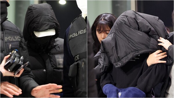 경복궁 담장에 스프레이로 불법 영상 공유 사이트 이름 등을 낙서 후 도주한 혐의를 받는 피의자 10대 남녀가 19일 서울 종로경찰서에 붙잡혀 들어오고 있다.&nbsp;ⓒ뉴스1